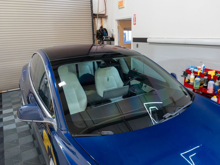 The finished windshield on the Tesla in the ACP bay